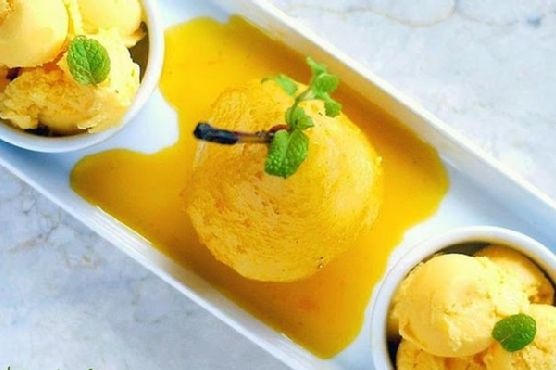 Classy Poached Pear In Spicy Mango Nectar With Mango Ice Cream | Made by Meaghan Moineau